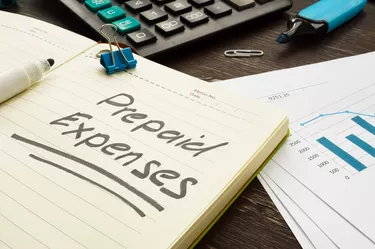 How are prepaid expenses adjusted on the general ledger?